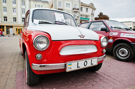 Tarnopol, Ukraine - October 09, 2016: Classic retro car dual color white & red  ZAZ Zaporozhets 965 designed and built from 1960-1963, with license plate LOL