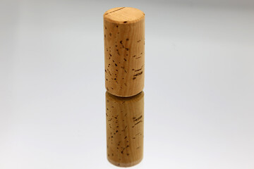 cork stopper, reflected on white background