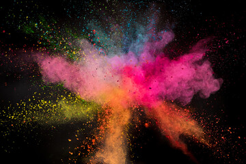 Launched colorful powder on black background, freeze motion