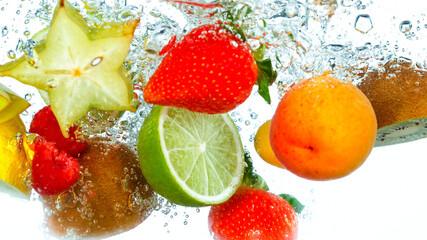 Freeze Motion Shot of Fresh Fruits Falling Into Water Isolated on White Background.