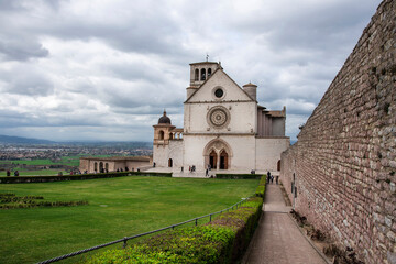 Fototapeta na wymiar Italy, front of the Basilica of St. Francis in Assisi, medieval city of central Italy, birthplace of St. Francis and St. Clare