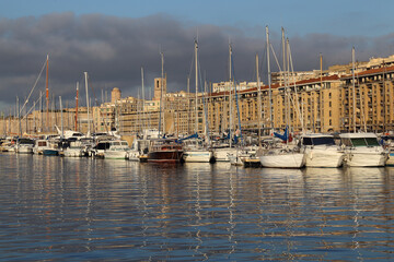 Fototapeta na wymiar Sunrise on Marseille harbor, France