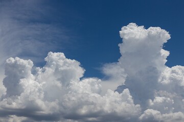 Naklejka na ściany i meble Blue sky with white clouds before raining. Textured background, natural background.
