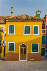 Traditional brightly colored house on Burano island, Italy