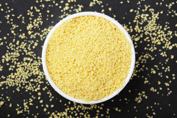 A ceramnic bowl with dry mais seeds