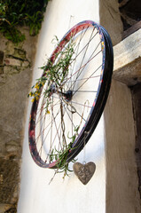 Old bike wheel with heart