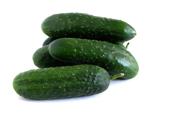 Cucumbers on a white background. Suitable for mockups and backgrounds. Cooking. Vegetables.