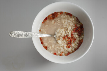 bowl of rice with chopsticks