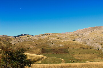 Fototapeta na wymiar Hilly and mountainous landscape on the Bosnian mountain Bjelasnica.