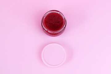 Homemade berry jam in a glass jar. Copy space - concept for dessert, food, preservation