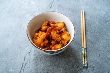 Stir Fry Mongolian Chicken with Chopsticks.