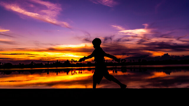silhouette of a woman doing yoga