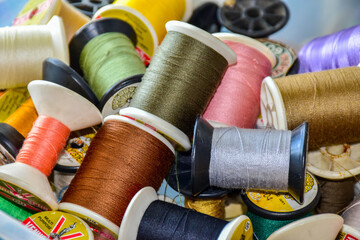 Roll many color thread for sewing.