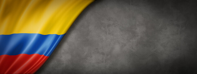 Colombian flag on concrete wall banner
