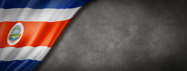 Costa Rican flag on concrete wall banner