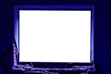 Rectangular frame, window opening in an old brick house. Blue backlight from the screen. Layout with empty space for the designer.View from the inside
