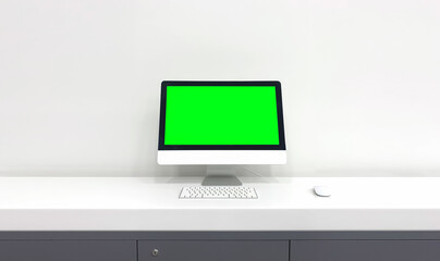 Blank green screen computer over white background.