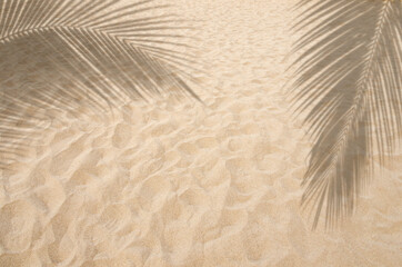 Fototapeta na wymiar footprints on the beach sand
