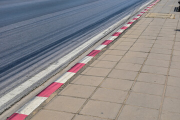 Footpath Stripe color red and white for Absolutely no parking of all kinds Thailand.