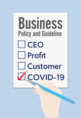 hand grab pen and choose COVID-19 in business plan form, concept for new normal