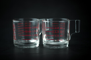 Volumetric measuring glass