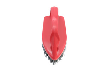Red plastic brush in the shape of an iron isolated on a white background