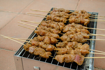 Satay is a Southeast Asian dish of seasoned, skewered and grilled meat, served with a sauce. It is from Indonesia and popular in Malaysia, Philippines, Singapore, Thailand, and Brunei.