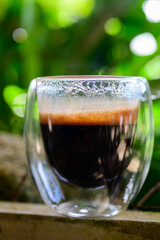 Cup of espresso on the table