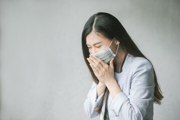 Women who have a cough and are sick with a flu infection, therefore have to use masks to cover the mouth and nose.