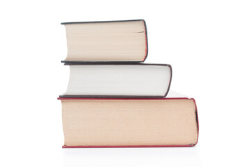 Stack of books close up on white background