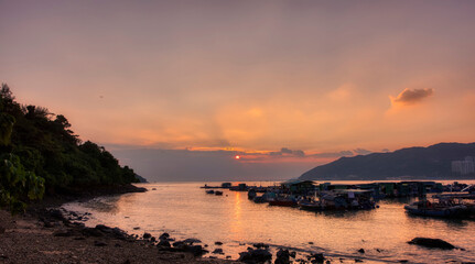 Obraz premium Sunset at the small village