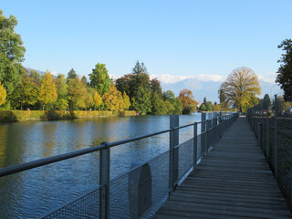 View of Lake Thun, Switzerland with autumn foliage and mountains