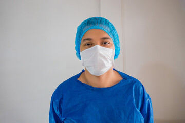 Surgeon Posing In Hospital Corridor