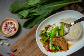 Stir fried kale with pork and hot smoky rice.