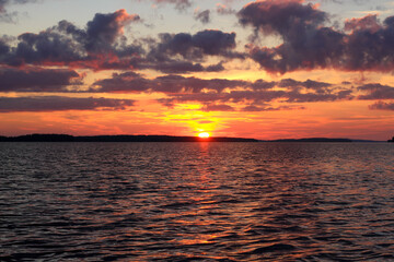 sunset over the lake in finland