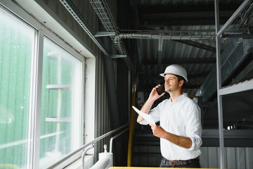 Portrait of an engineer talking on the phone