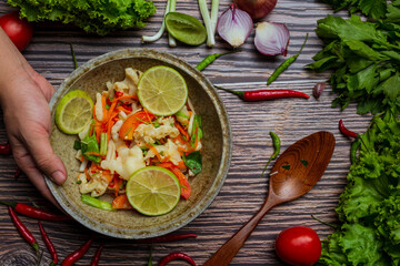 mixed vegetable and chicken feet , Thai spicy salad.