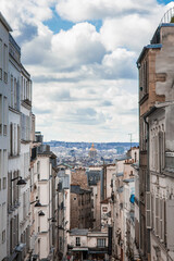 Obraz premium View of old district of Paris city with old skyscrapers above, France