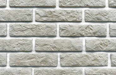 Brick wall of beige bricks. Background and texture of brickwork.