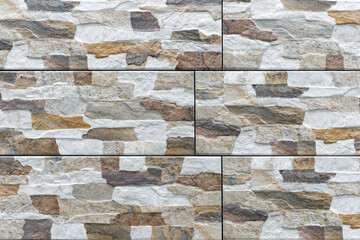 Porcelain tiles with brown and gray stains. Background and texture of granite.