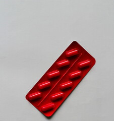 red pills on white background