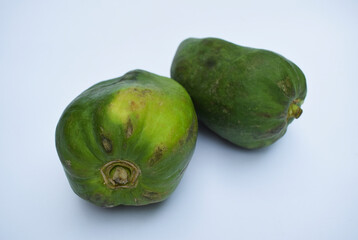 Green papaya, papaw or pawpaw or Raw papaya fruit Indian Mexico American