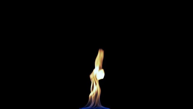 Fire flame Isolated on black background. Fire Flames Igniting And Burning Slow Motion. A line of real flames ignite on a black background Real fire. Perfect for the layer with different blending modes