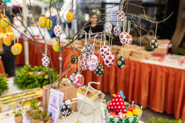 Souvenir market with colorful Easter candles and eggs in the Cretan store.
