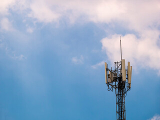 Mobile phone broadcasting tower ,Telecommunication cell site for spreading telephone signals and blue sky background