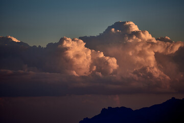 The sky with beautiful large thunderclouds above the mountain