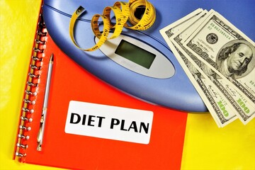 Diet plan-the text label in the folder, a healthy lifestyle and money for the regime of rules of food consumption, the main goal-weight loss.