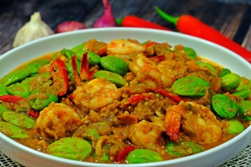 Spicy stir fried shrimps and Parkia nuts with shrimp paste.