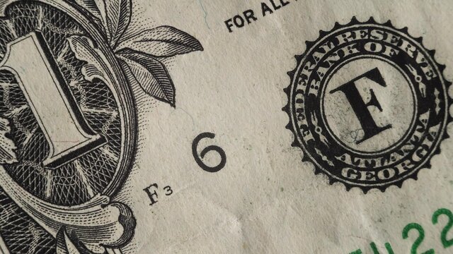 One dollar banknote stop motion macro close up shot. Macro USD finance freedom and investment. 1 dollar depicted George Washington and other side sign. Nice cinematography documentary money footage