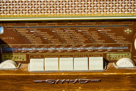 Close-up of an old analog tube radio from Emud electric Company with the station displays of the European radio stations